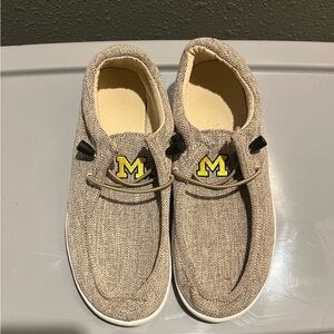 Men’s tan Michigan shoes size small (7-8).